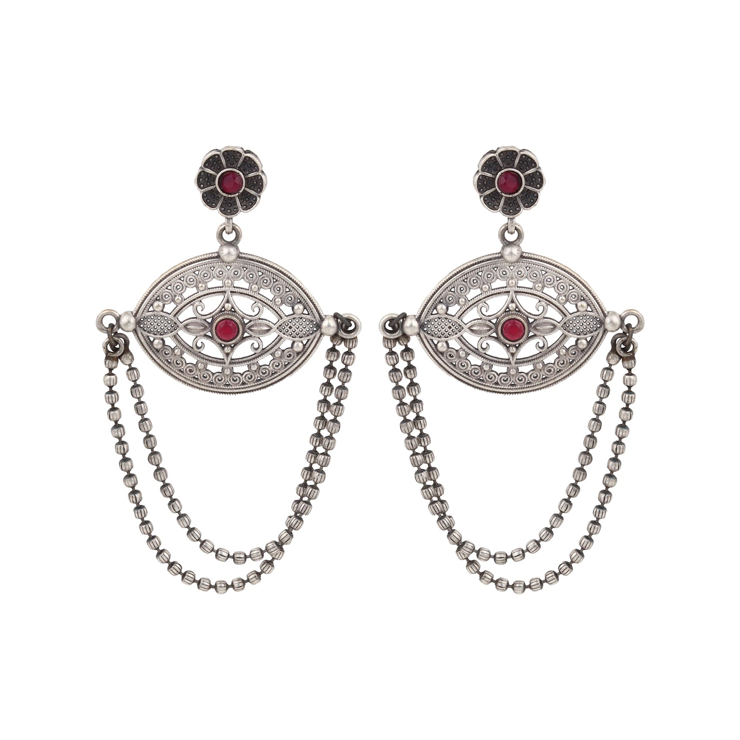 Silver-tone, traditional brass stud earrings shown on dark background