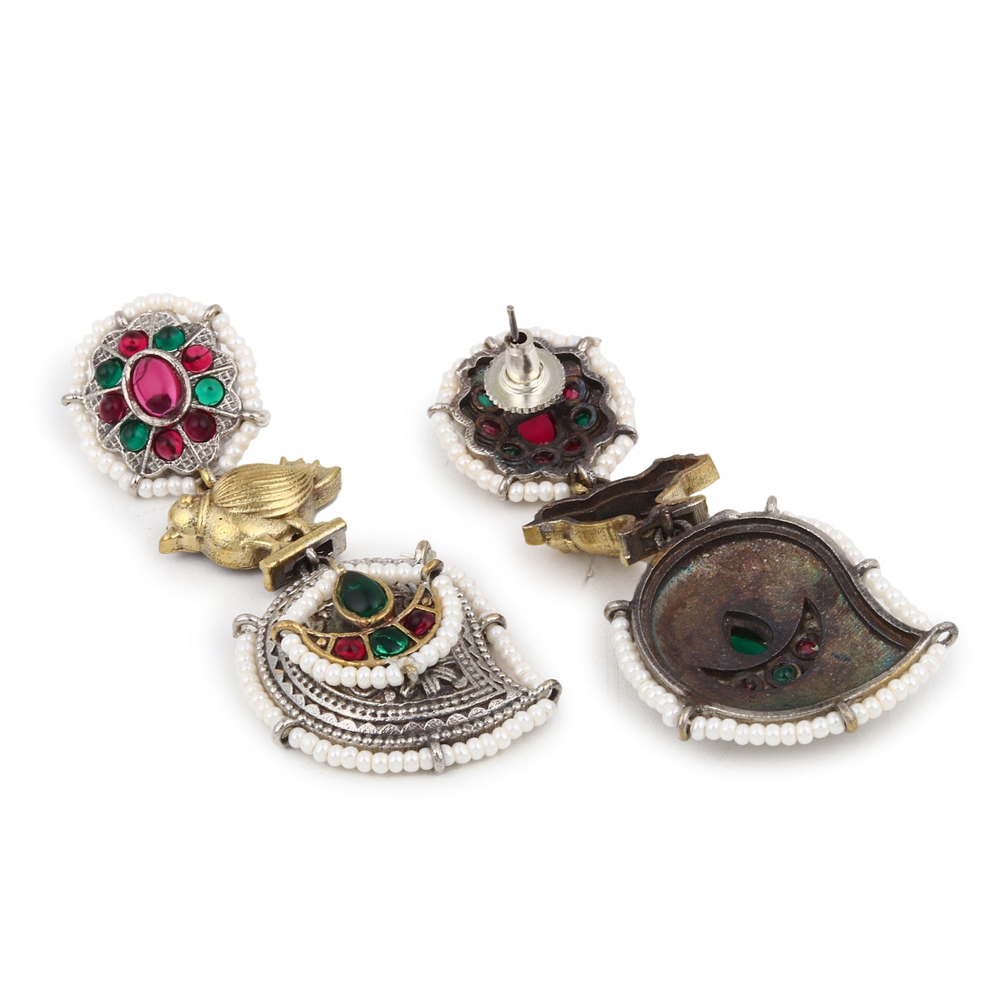 Red and silver stud earrings, Rimisha by Naitri, festive design on display.