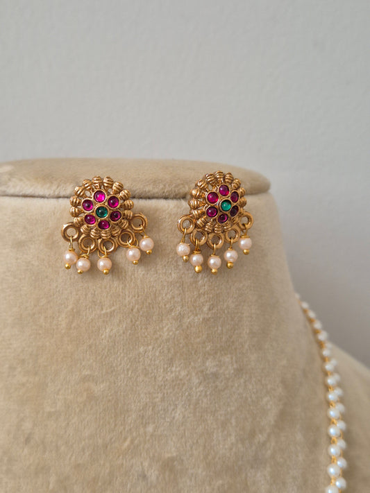 Gold and pearl with pink floral design earrings by naitri.in