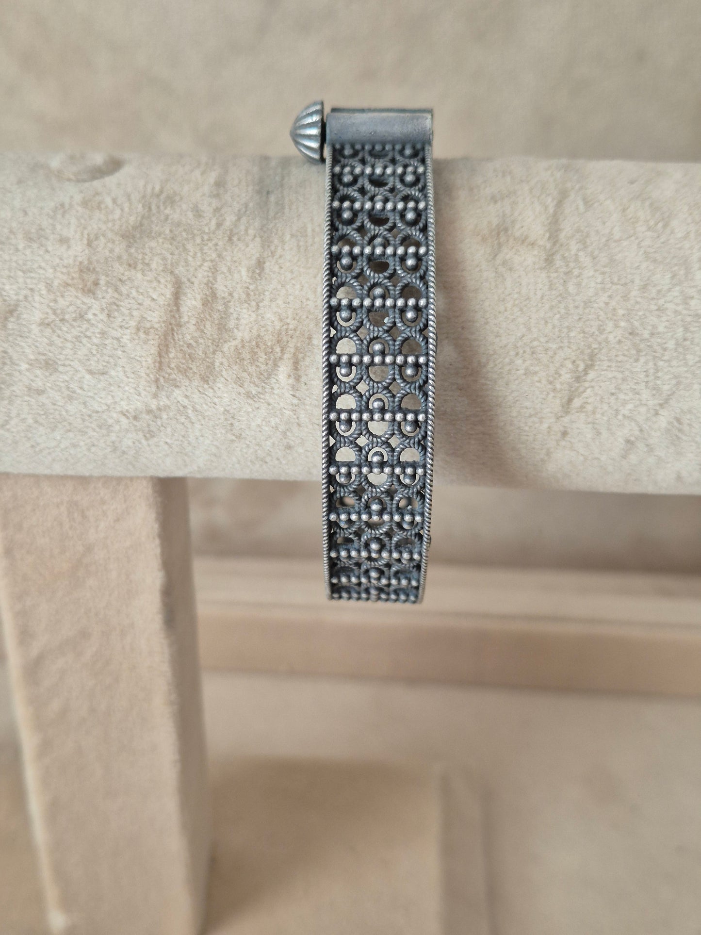 Traditional style silver textured bangle bracelet by naitri.in