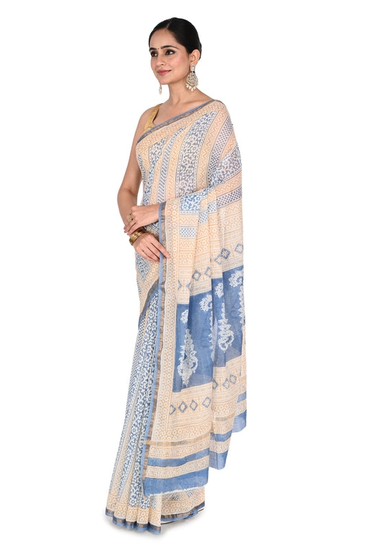 Light blue and beige hand block printed saree with a gold-toned border and matching blouse by naitri.in