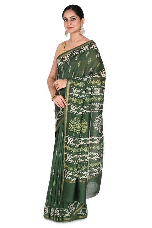 by Naitri. Traditional Bagh print saree with tree of life patterns and gold border, handcrafted in Madhya Pradesh by naitri.in