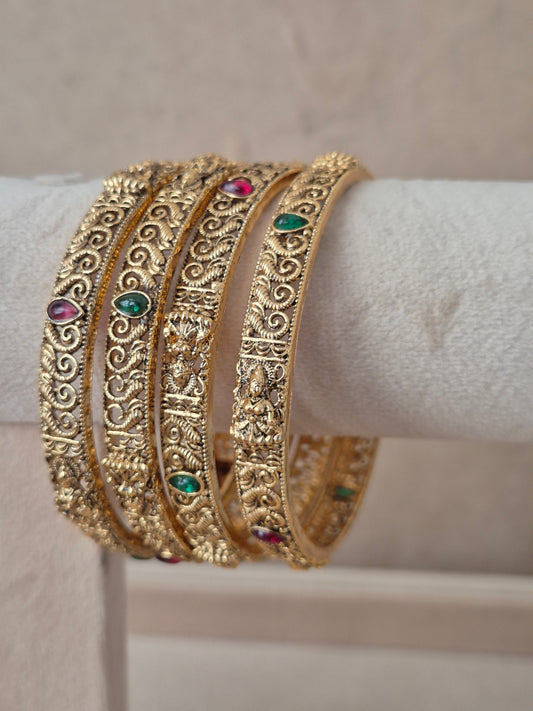 Malati Bangles set of 4, traditional Indian gold-plated bangles with red and green stones, ethnic festive and bridal jewelry collection by Naitri.in