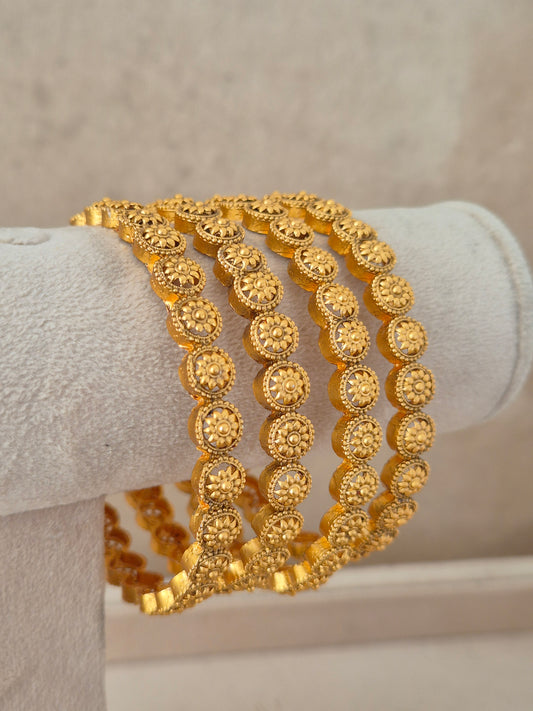 Prathna Bangles set of 4 – traditional gold-plated ethnic bangles with detailed geometric crafting by Naitri.