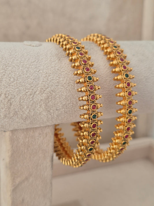 Saniya Bangles set of 2 – traditional gold-plated ethnic bangles with textured geometric detailing by Naitri.in