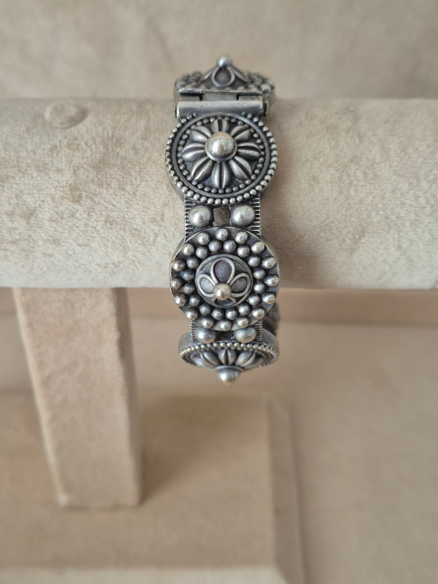 Traditional style silver textured bangle bracelet by naitri.in