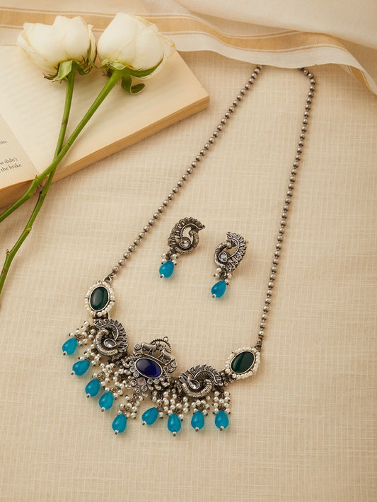 Silver and blue dangle necklace set, Amrita by Naitri, pendant style.