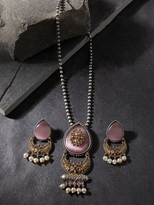 Brass choker necklace set with pink and silver pendant, luxurious display