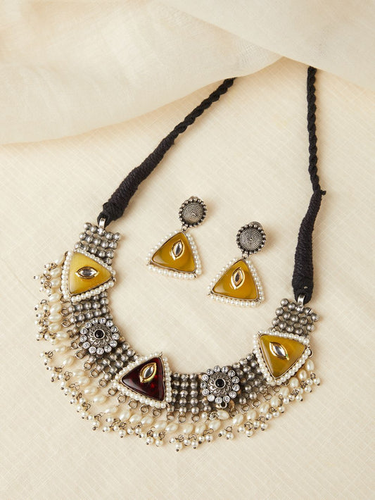 Bright yellow choker and necklace set, upright display for statement elements