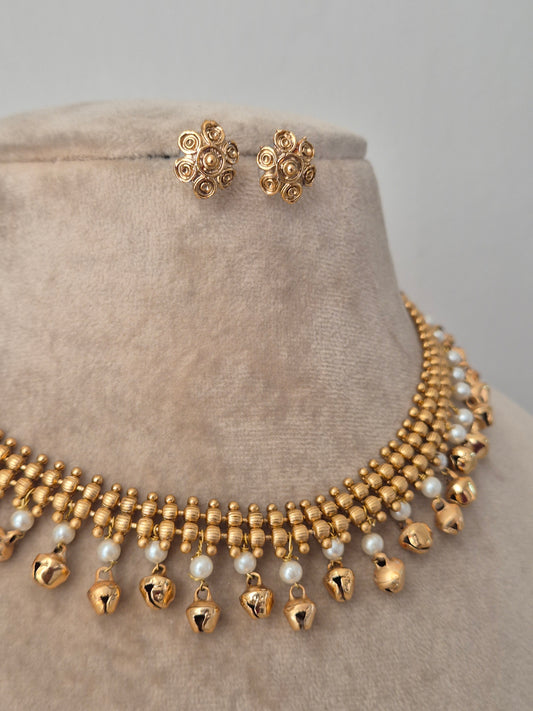 combination of gold and pearl and ghungroo beads and golden imitation jewellery set by naitri.in