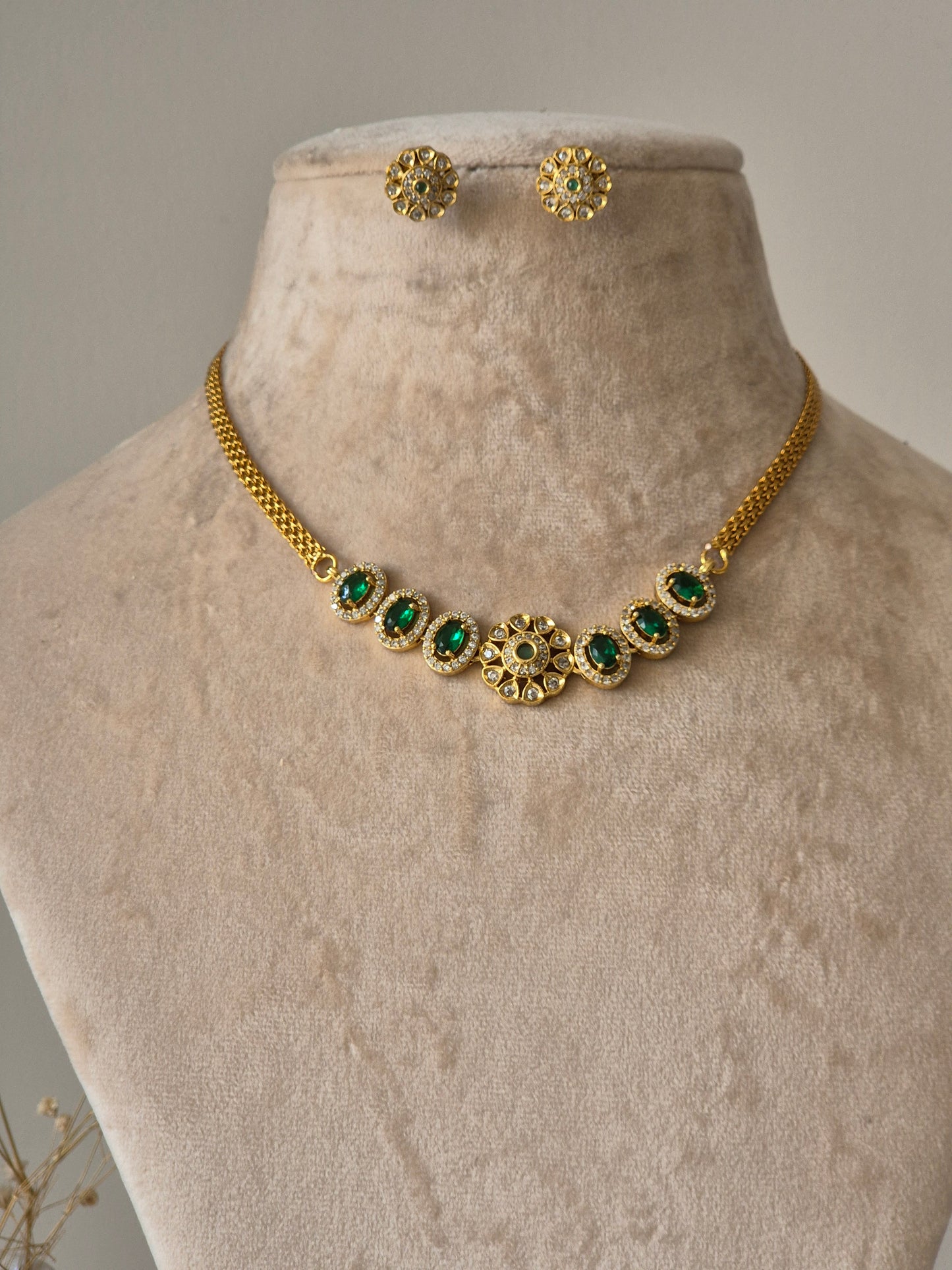 Handcrafted Smriti Gold Necklace Set with green gemstones by Naitri