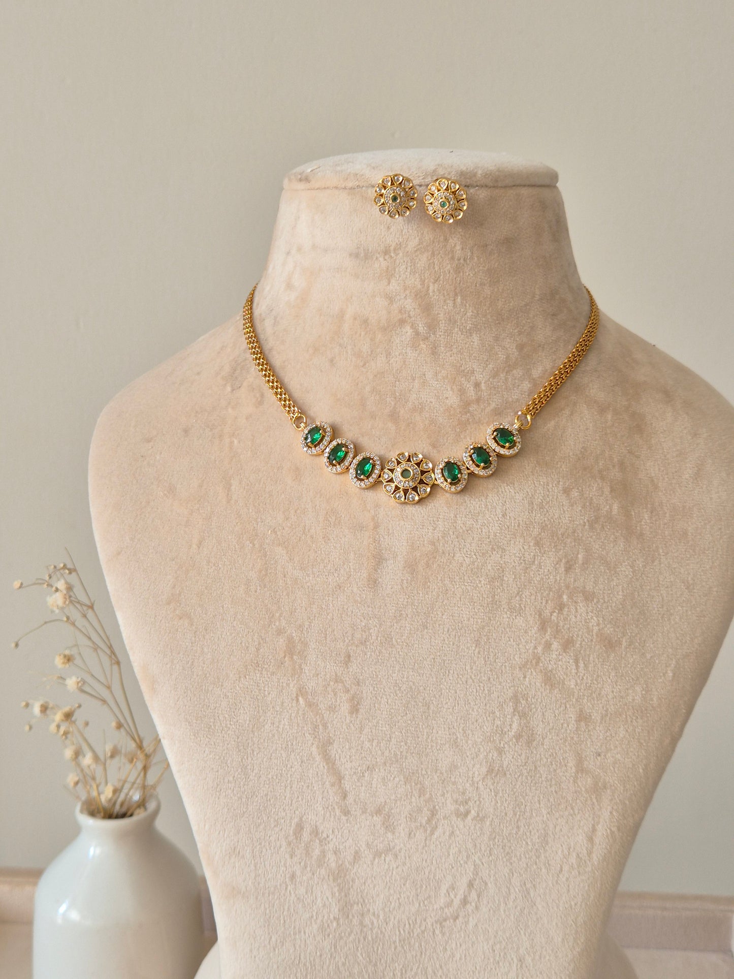 Handcrafted Smriti Gold Necklace Set with green gemstones by Naitri