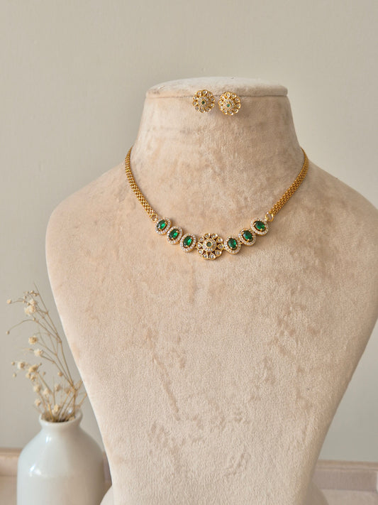 Handcrafted Smriti Gold Necklace Set with green gemstones by Naitri