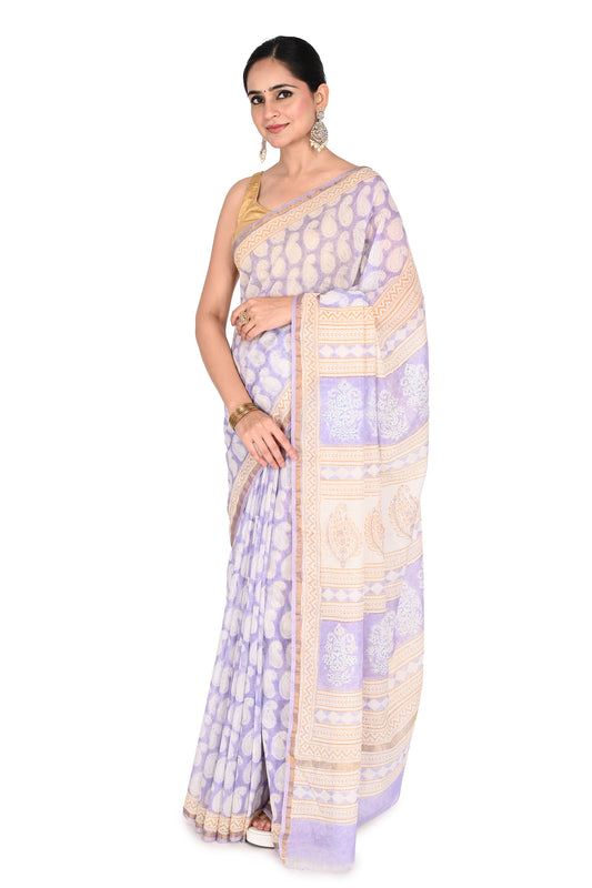 Intricate Bagh hand block printed cotton silk saree in shades of lavender and cream, styled in a classic drape by naitri.in