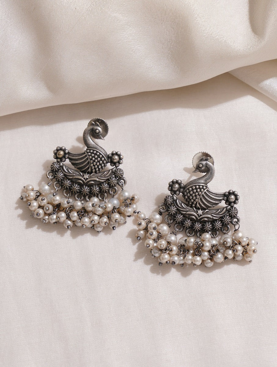 Long silver dangle earrings, Mrigya by Naitri, modern oxidized design.