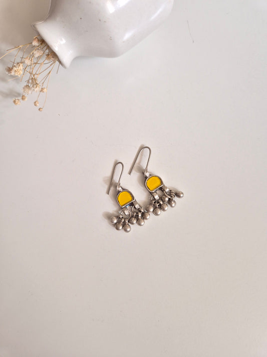 Clear and yellow glass dangle earrings, minimalist, glass detail visible