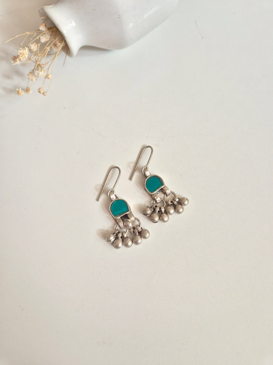 Silver glass dangle earrings, modern design, metalwork detail