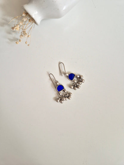 Blue glass and metal dangle earrings, detailed and hand-finished