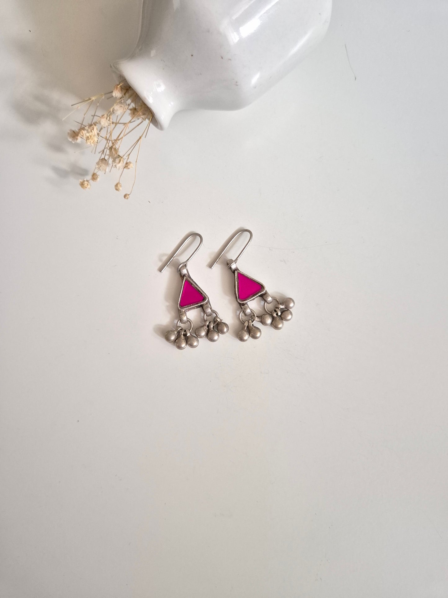 Pink glass dangle earrings, close-up for color and finish