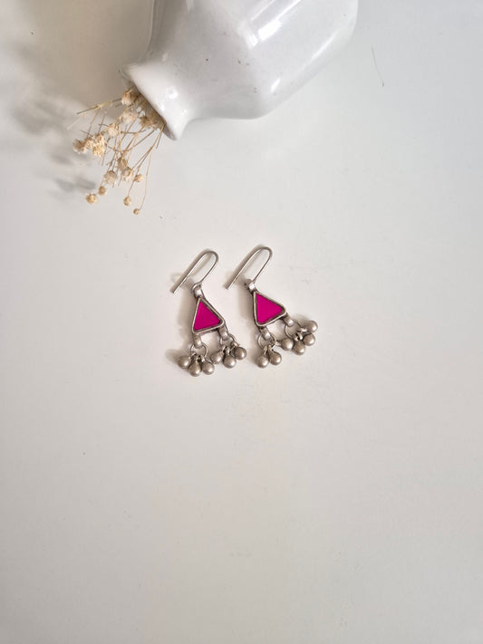 Pink glass dangle earrings, close-up for color and finish