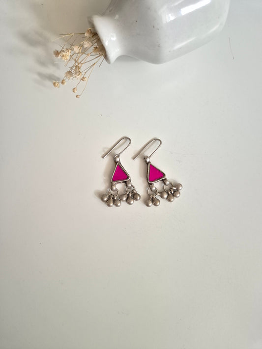 Pink glass dangle earrings, close-up for color and finish