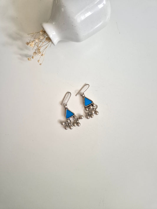 "Handcrafted blue glass earrings with dangle design, Viya Glass Earrings by Naitri.",