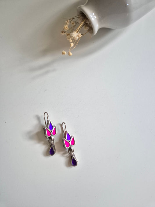 Purple and pink glass dangle earrings, Nisha Glass Earrings by Naitri, silver hooks displayed.