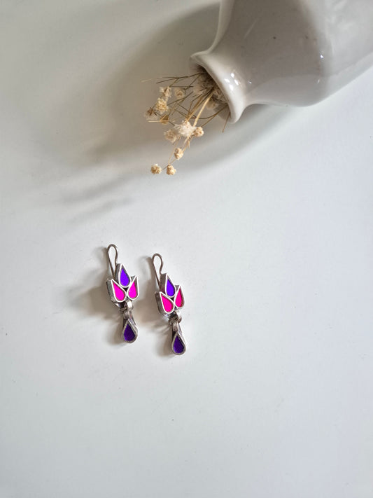 Purple and pink glass dangle earrings, Nisha Glass Earrings by Naitri, silver hooks displayed.