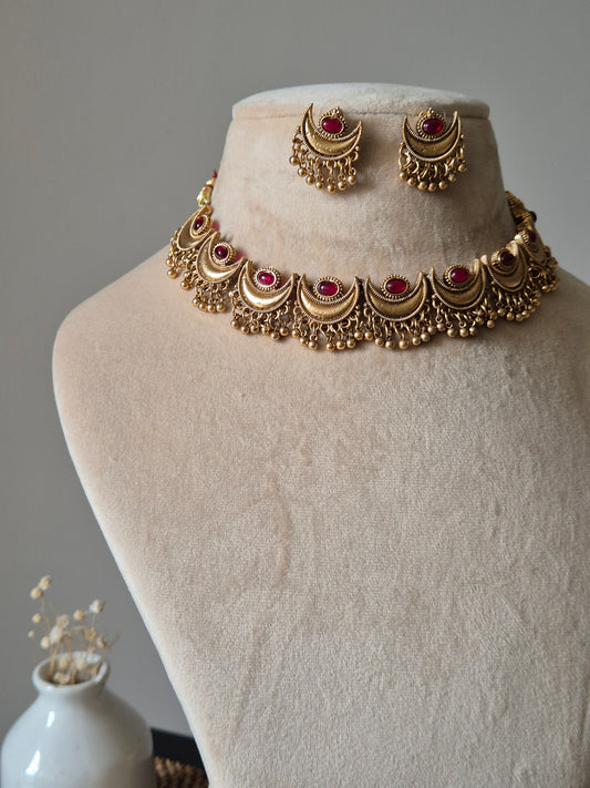Golden necklace set, Girija by Naitri, simple design on white.