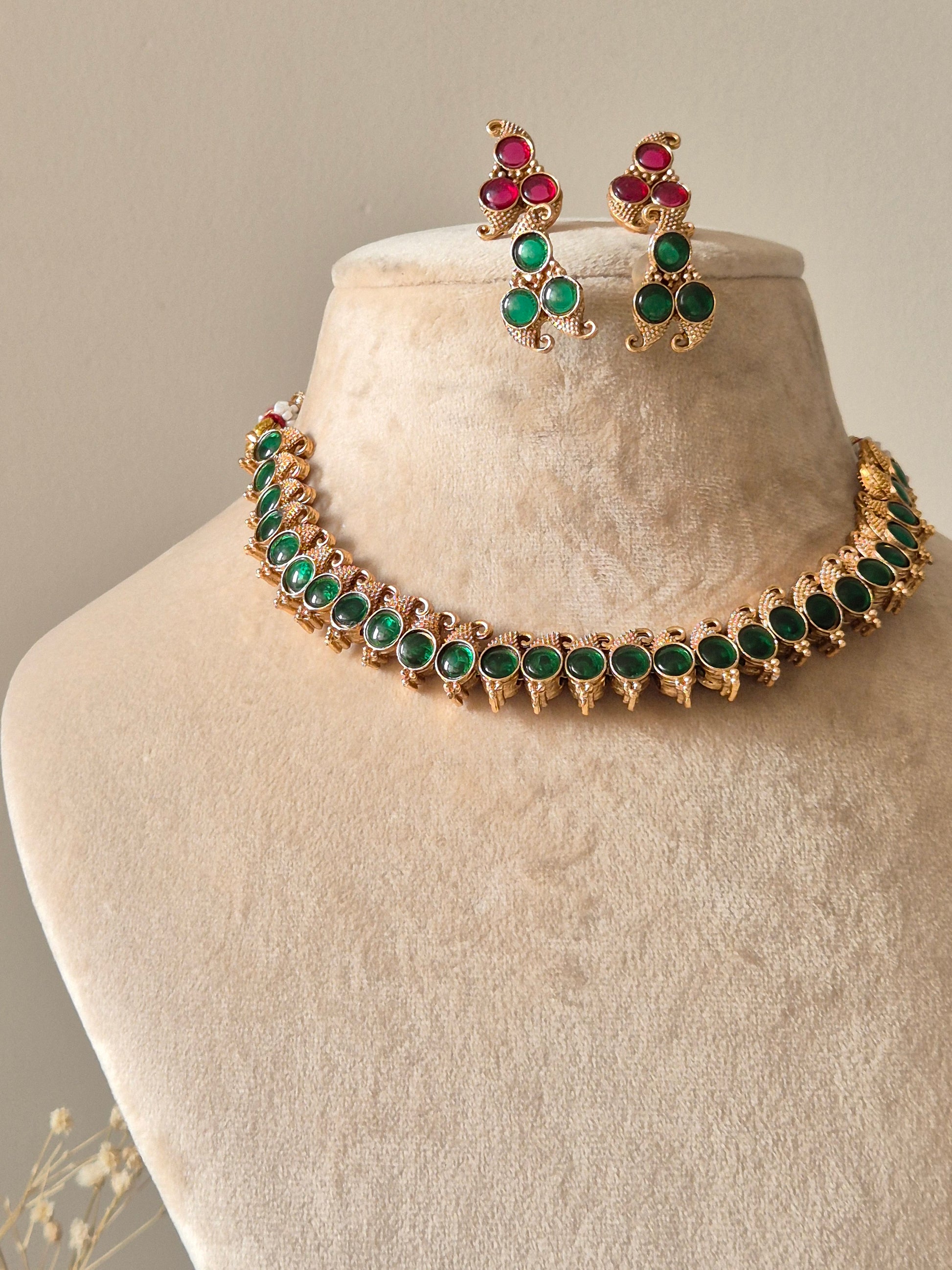 Reversible gold pendant necklace set, Kavi by Naitri, with stud earrings.