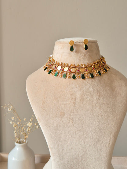 Gold choker necklace set, Meetu by Naitri on bust form.