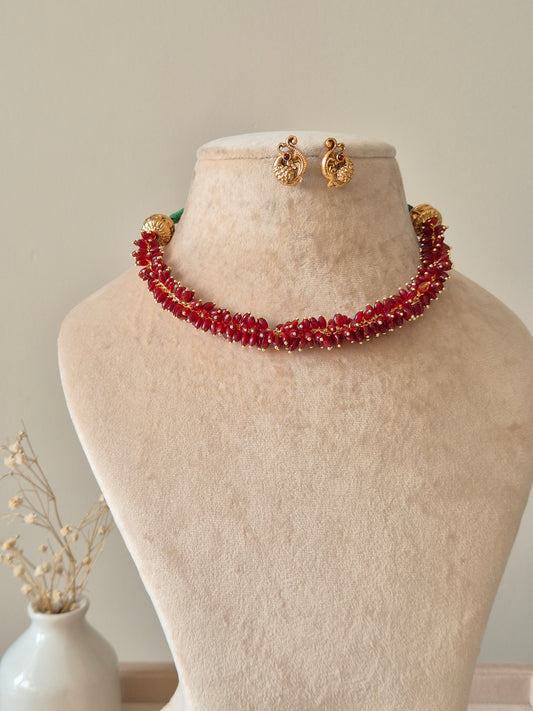 Gold and red choker necklace set, Sneha by Naitri, classic festive design.
