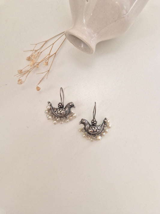 Suveera Earrings, handcrafted oxidized earrings with unique bird design, charming and lightweight.