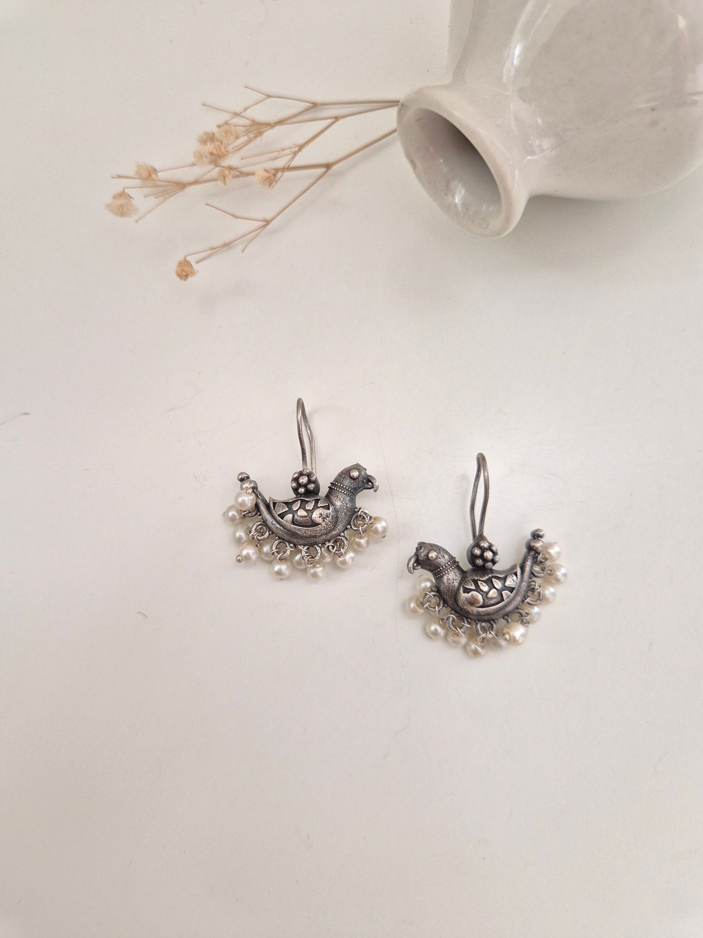 Suveera Earrings, handcrafted oxidized earrings with unique bird design, charming and lightweight.