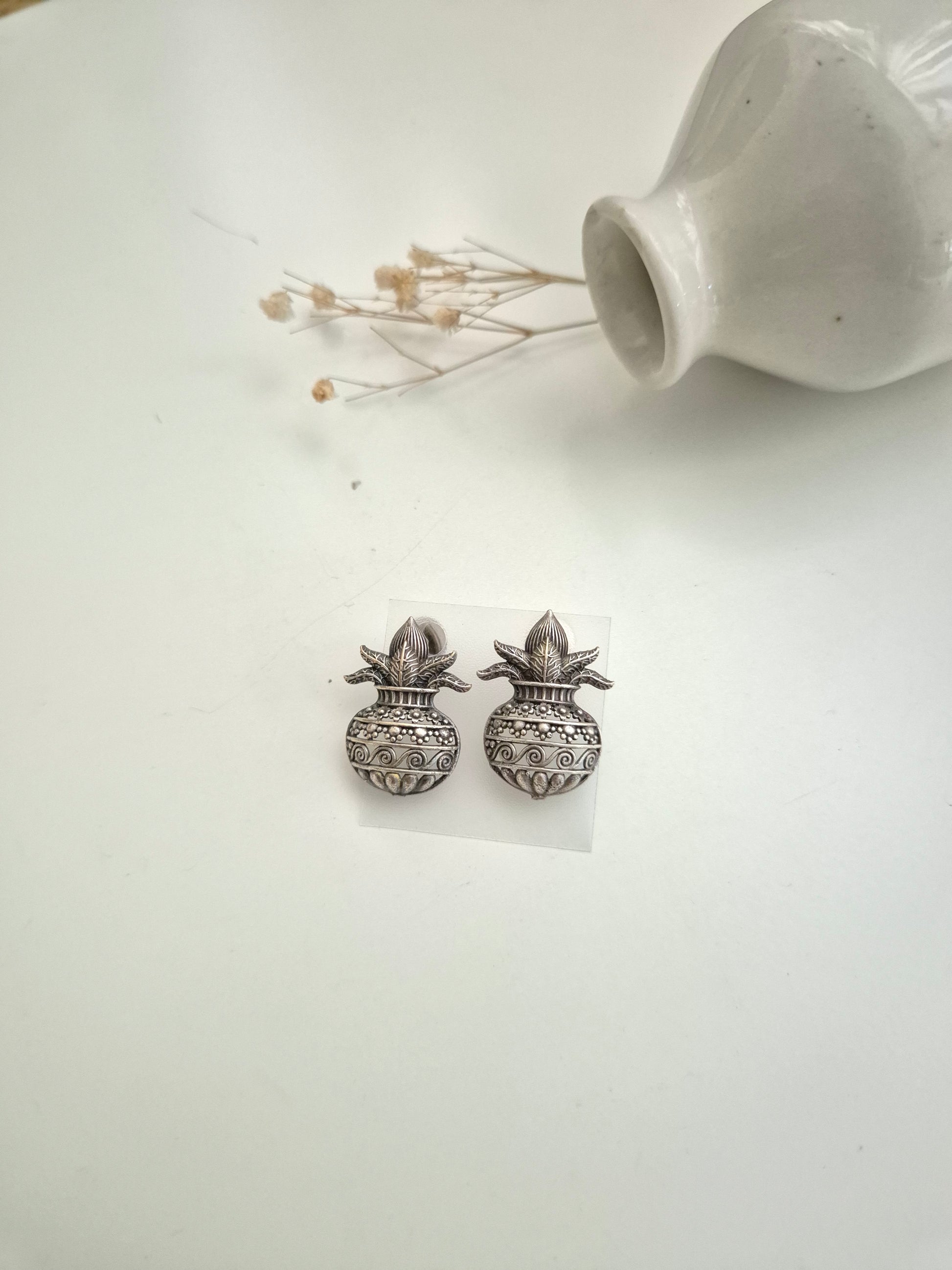 Naimisha Earrings, silver handcrafted oxidized stud earrings, unique handmade accessory.