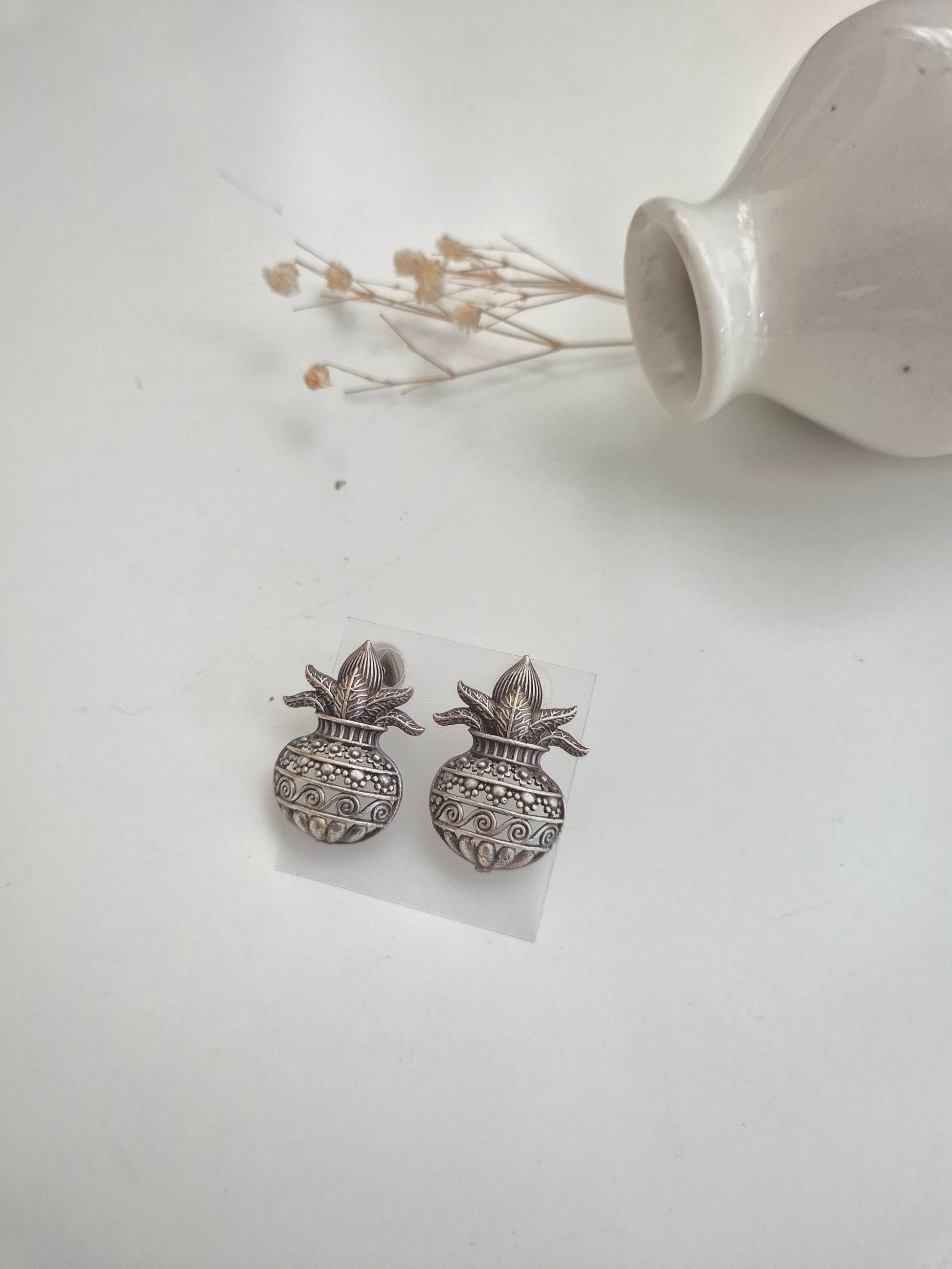Naimisha Earrings, silver handcrafted oxidized stud earrings, unique handmade accessory.