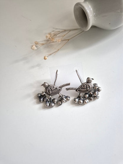 Hridaani Earrings, unique bird design handcrafted oxidized dangle earrings, artistic statement.