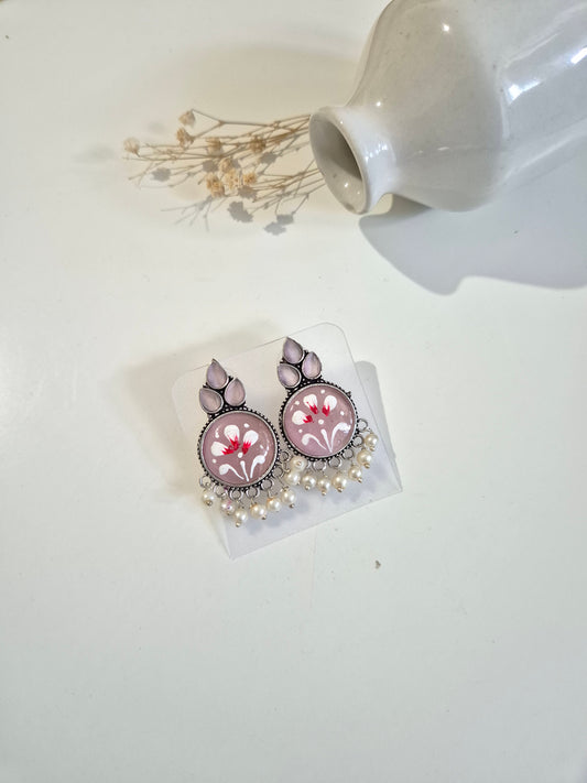 Adhira Earrings, pink handcrafted oxidized stud earrings, lightweight and contemporary accessory.