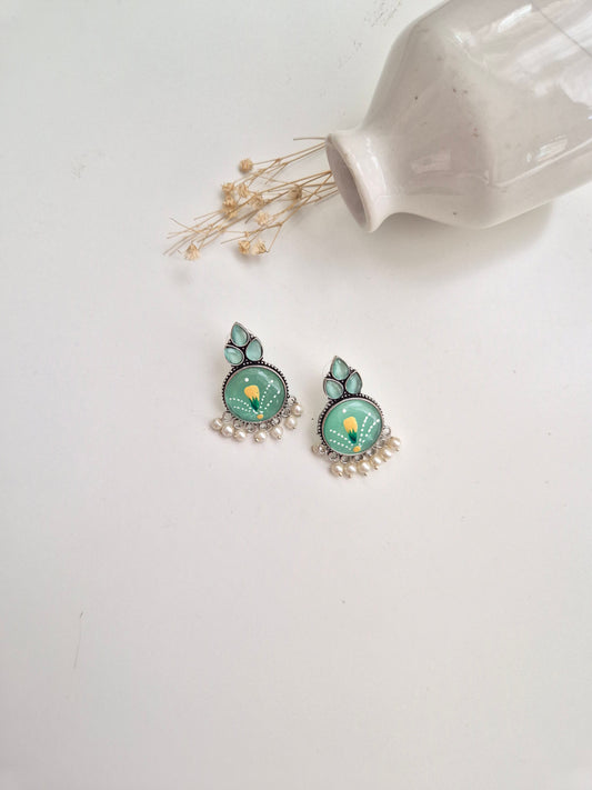 Harini Earrings, elegant green handcrafted oxidized dangle earrings, lightweight and artistic.