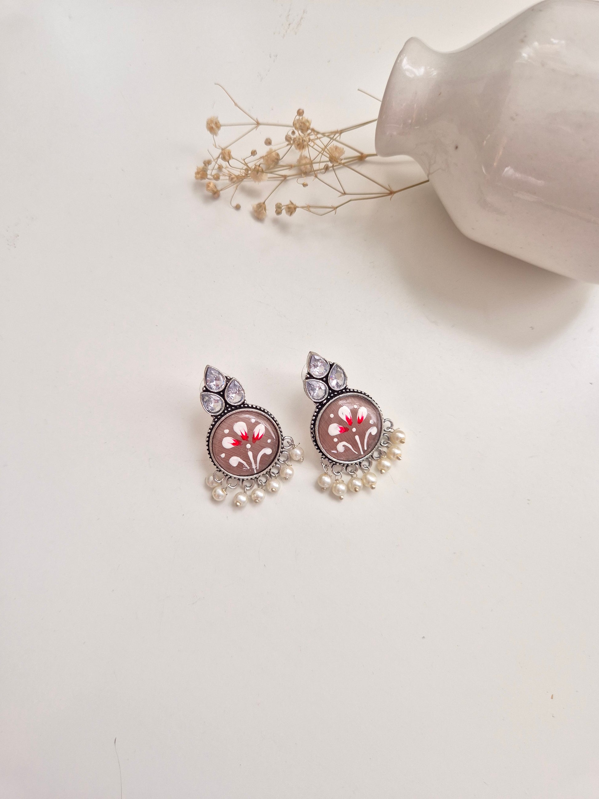 Jayanti Earrings, premium handcrafted oxidized red and silver jewelry, stylish and refined.