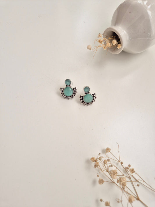 Pallavi Earrings, handcrafted oxidized jewelry with silver and green dangle, versatile and bold.