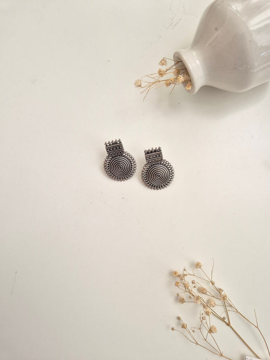 Elegant handcrafted oxidized Nishka Earrings in silver dangle design for stylish everyday wear.