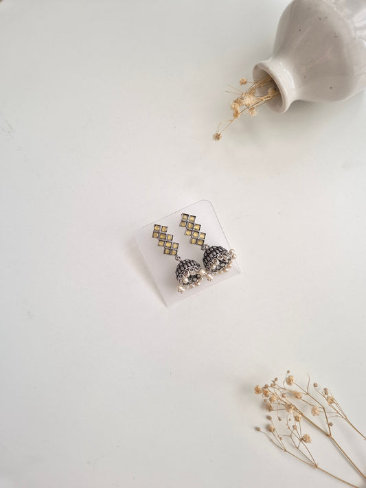 Mithila Earrings, handcrafted oxidized dangle earrings with silver and gold accents.