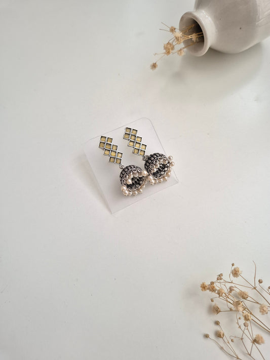 Mithila Earrings, handcrafted oxidized dangle earrings with silver and gold accents.