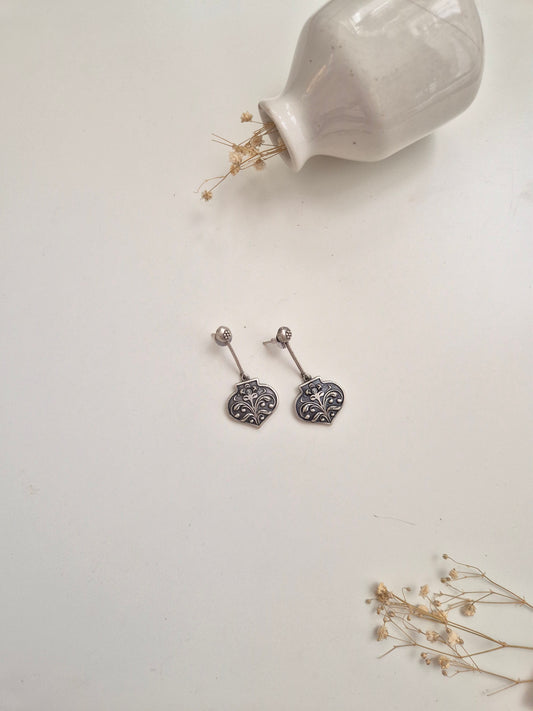 Silver look oxidized Ayati Earrings with dangle, drop, and stud styles, elegant and versatile.