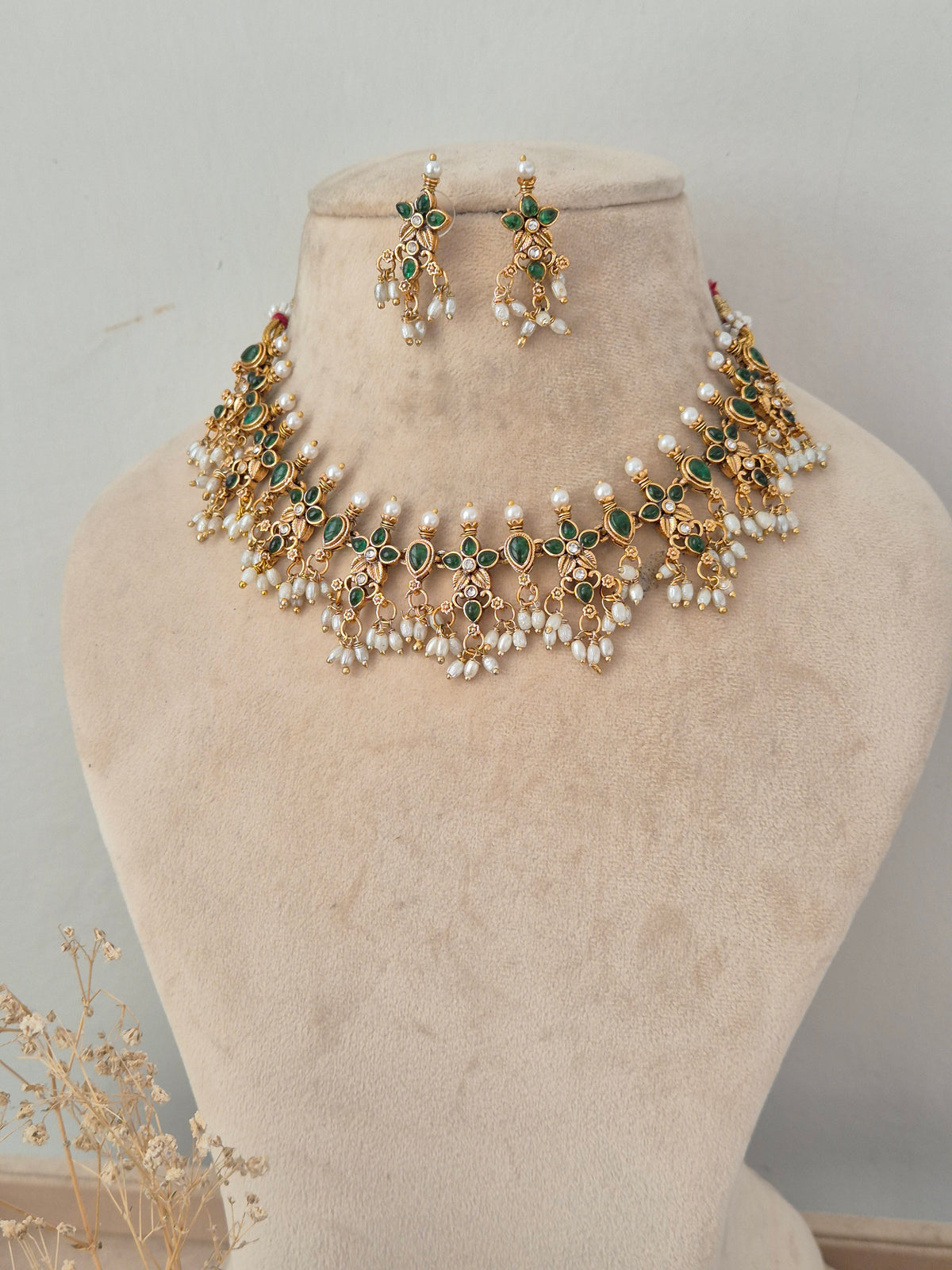 Ladli green stone and pearl gold choker necklace with matching earrings