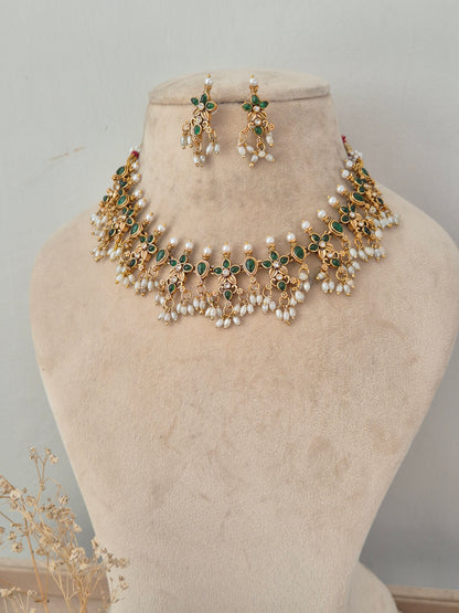 Ladli green stone and pearl gold choker necklace with matching earrings