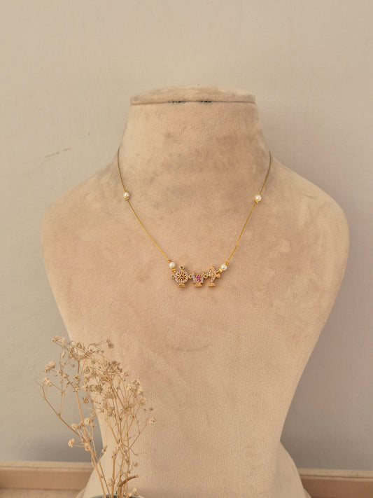 Ethnic gold invisible chain necklace set with mini temple motifs and pearl accents