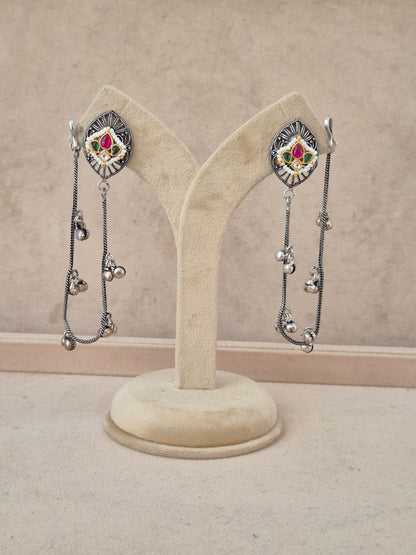 Oxidized silver dangle earrings with pink, green, and white stone embellishments and dangling chains
