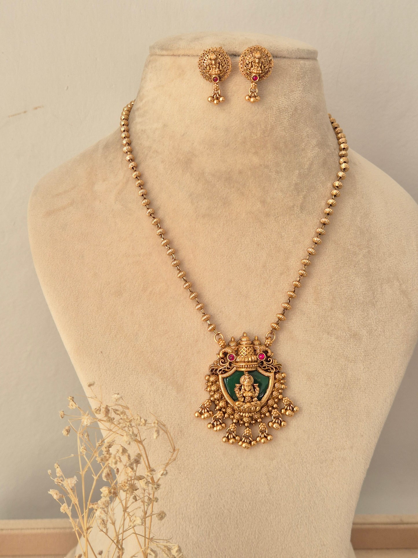 Charumati Necklace Set antique gold temple jewelry long chain with green enamel Lakshmi pendant and matching earrings by Naitri